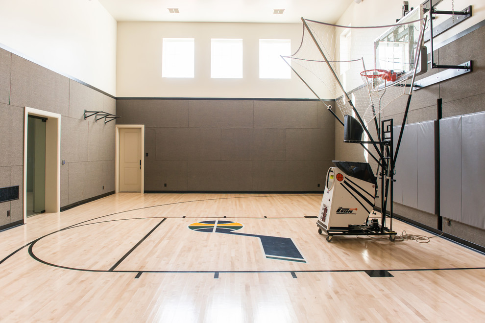 Inspiration for a large traditional indoor sport court in Salt Lake City with grey walls, light hardwood floors and beige floor.