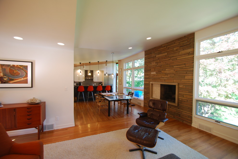 This is an example of a midcentury living room in Other.