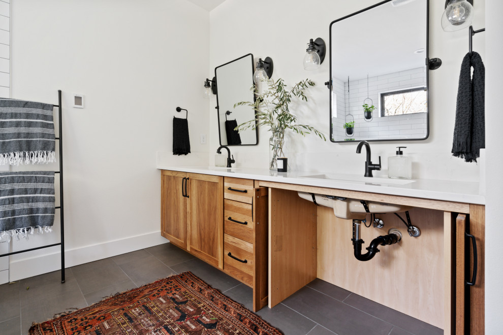Large cottage master white tile and subway tile ceramic tile, gray floor and double-sink bathroom photo in Portland with shaker cabinets, brown cabinets, a one-piece toilet, white walls, an undermount sink, quartzite countertops, white countertops and a built-in vanity