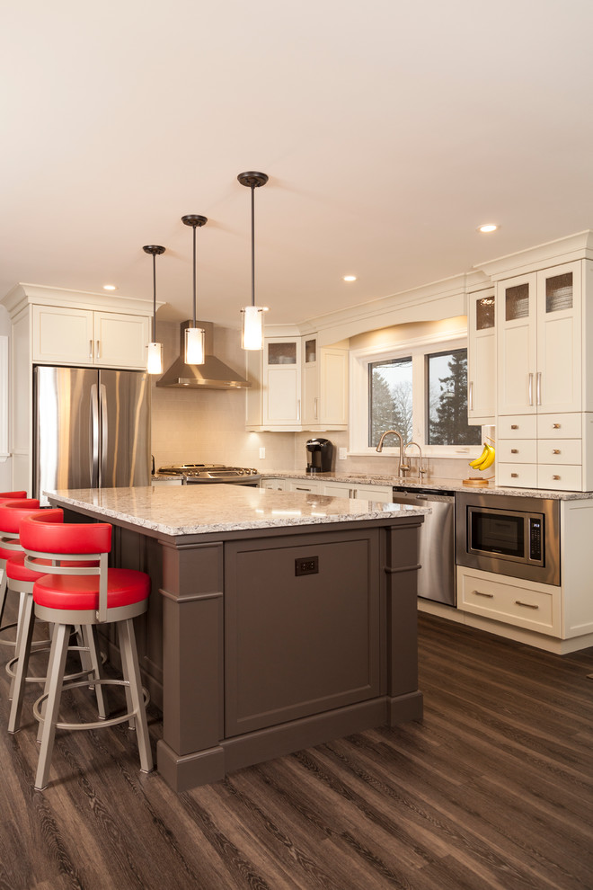 Example of a transitional kitchen design in Toronto