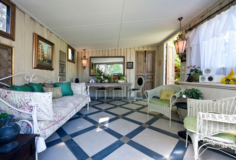 This is an example of a mid-sized eclectic sunroom in Perth.