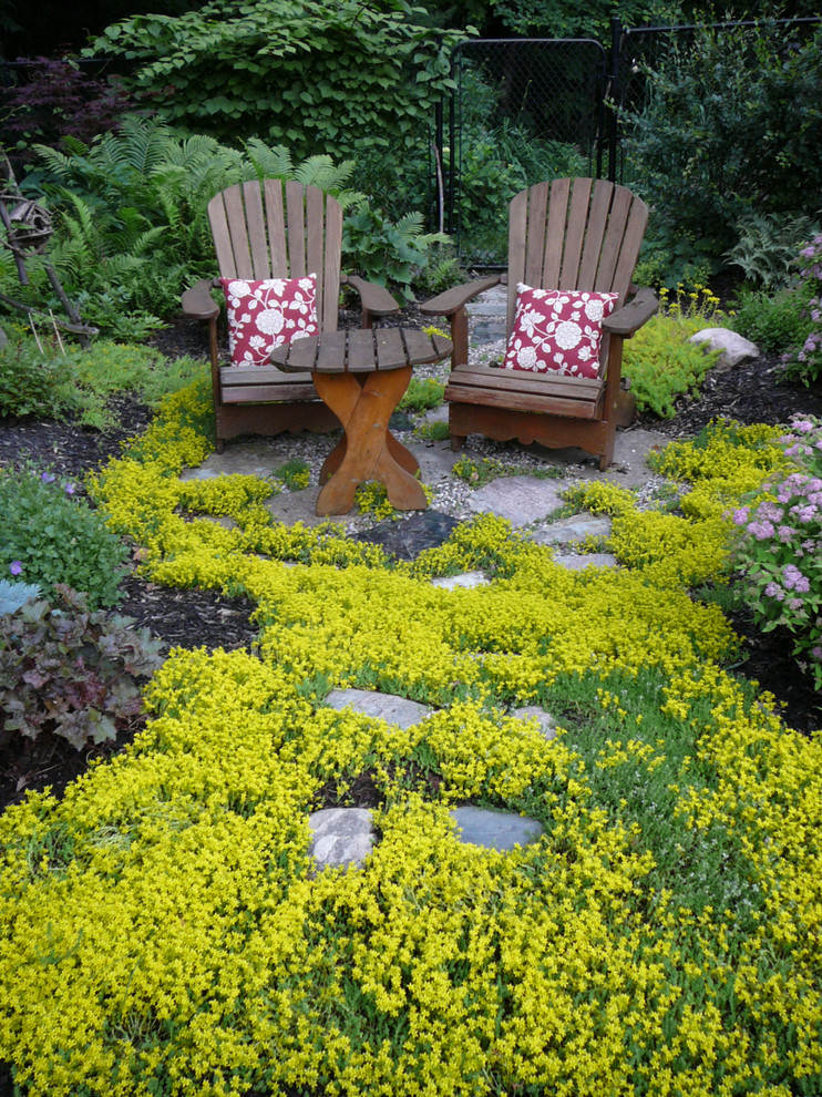 This is an example of a traditional full sun garden in Ottawa.