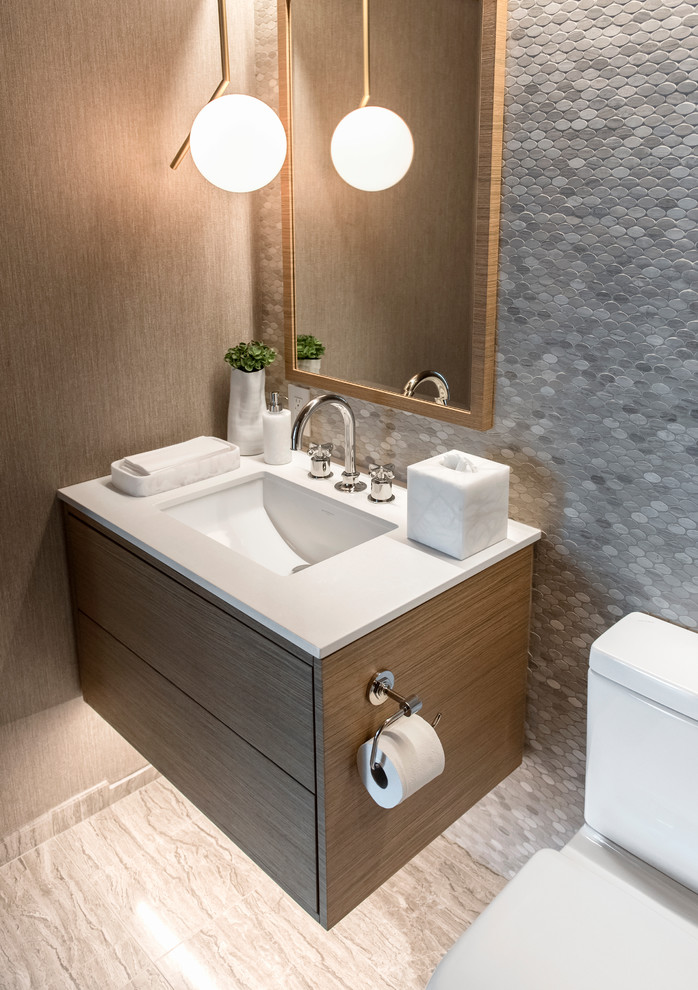 This is an example of a mid-sized contemporary 3/4 bathroom in Vancouver with flat-panel cabinets, brown cabinets, a two-piece toilet, gray tile, mosaic tile, brown walls, porcelain floors, an undermount sink and wood benchtops.