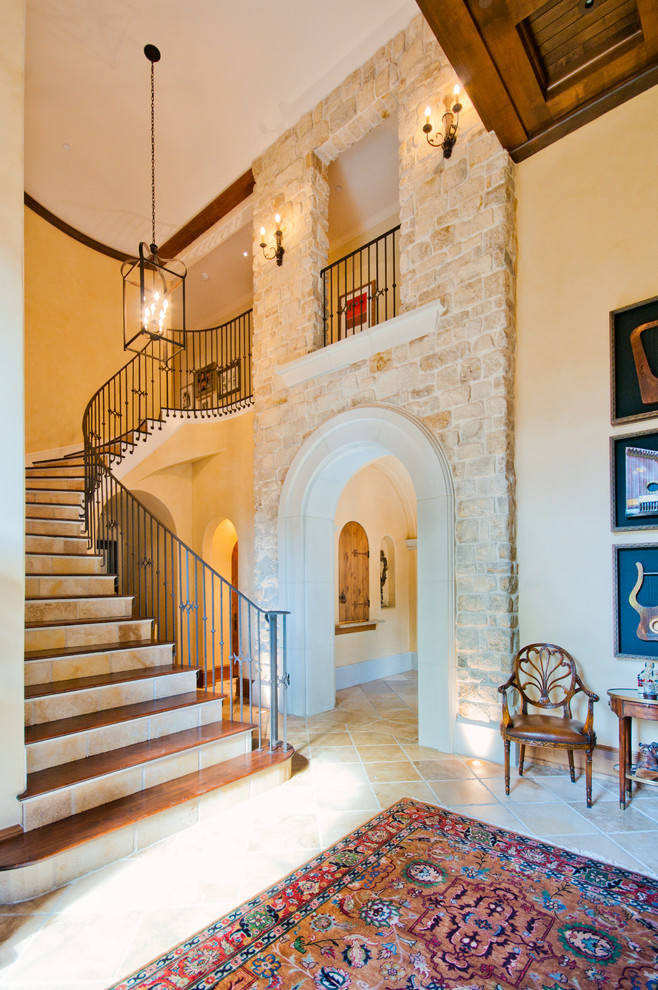 Inspiration for a traditional staircase in Houston with tile risers.