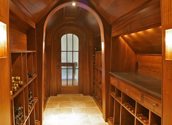 Inspiration for a large rustic slate floor wine cellar remodel in Charlotte