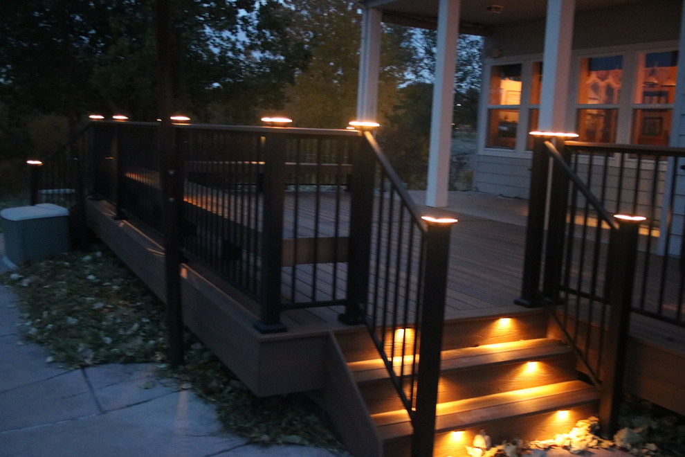 Mid-sized transitional backyard deck photo in Denver with no cover