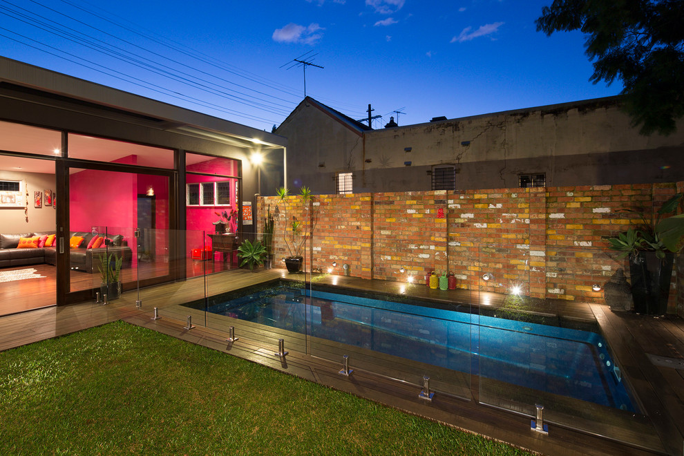Large contemporary rectangular pool in Sydney with decking.