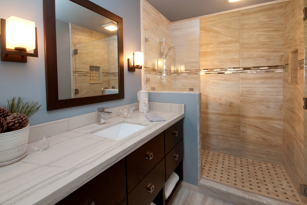 Photo of a mid-sized modern bathroom in San Francisco with an undermount sink, flat-panel cabinets, dark wood cabinets, quartzite benchtops, an open shower, a one-piece toilet, multi-coloured tile, porcelain tile, blue walls and porcelain floors.