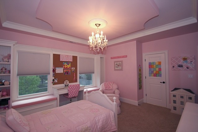 Inspiration for a mid-sized contemporary kids' bedroom for kids 4-10 years old and girls in Chicago with pink walls and carpet.