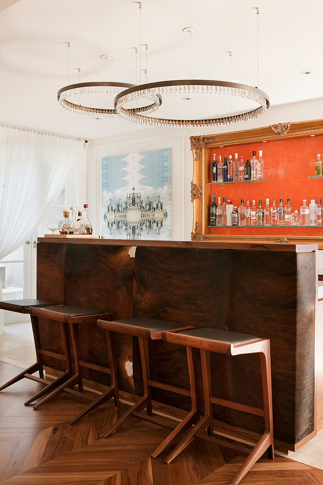 Inspiration for a transitional seated home bar in Melbourne with dark hardwood floors, wood benchtops, brown floor and brown benchtop.