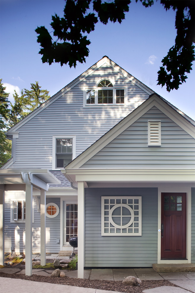 Design ideas for a traditional exterior in Detroit with wood siding.
