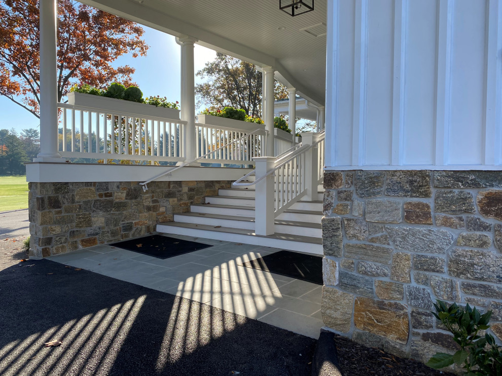 Inspiration for a classic house exterior in Baltimore with stone cladding.