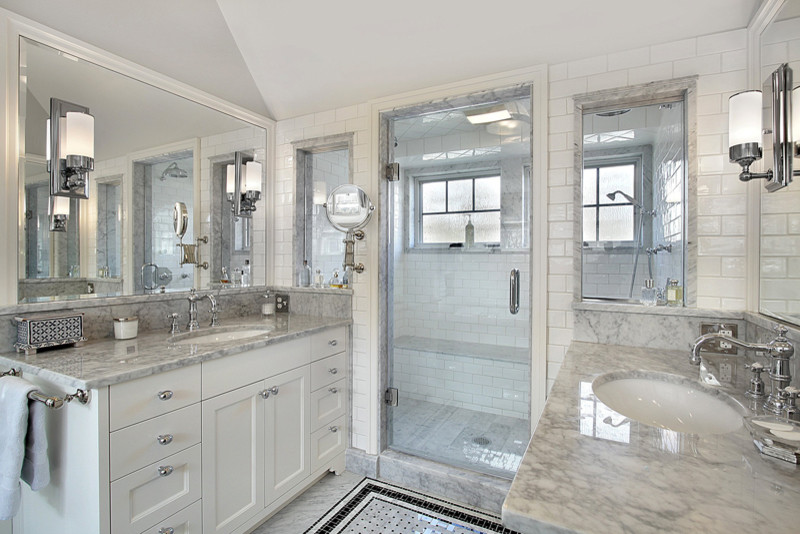 Photo of a mid-sized contemporary master bathroom in Atlanta with shaker cabinets, white cabinets, an alcove shower, black and white tile, stone tile, white walls, marble floors, an undermount sink and marble benchtops.