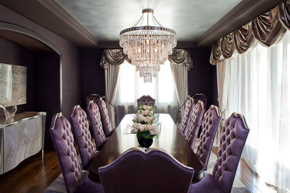 This is an example of a large contemporary separate dining room in Los Angeles with purple walls.