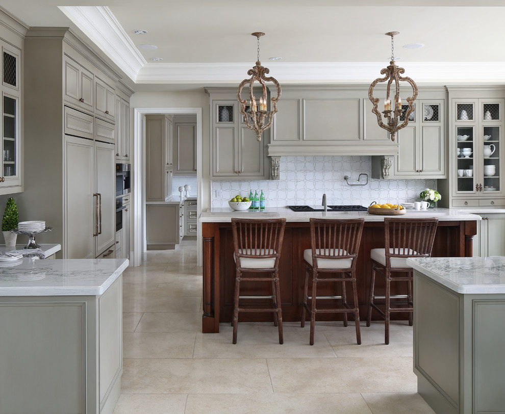 Transitional u-shaped kitchen in San Francisco with recessed-panel cabinets, grey cabinets, white splashback, panelled appliances, with island and beige floor.