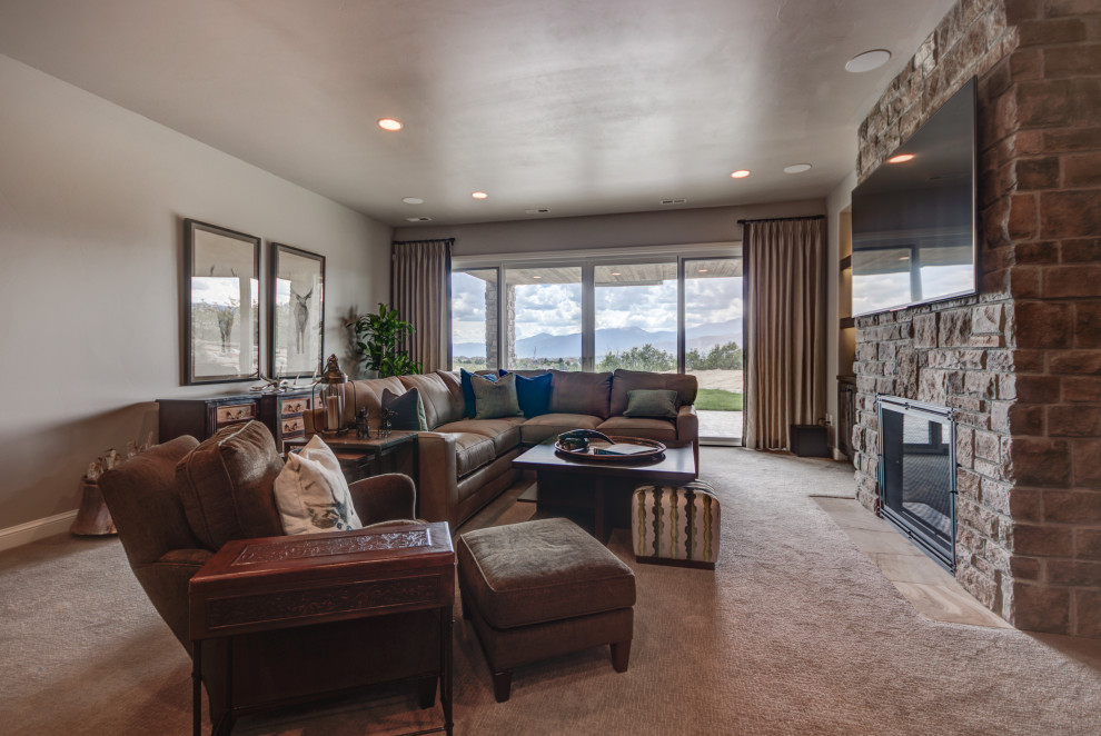 Example of a transitional home design design in Denver