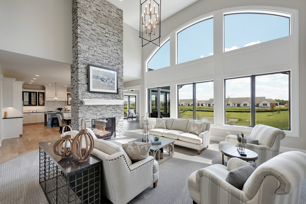 Large beach style open concept family room in Chicago with carpet, a two-sided fireplace and a stone fireplace surround.