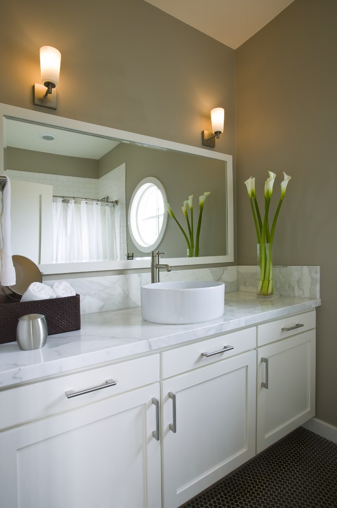 Design ideas for a mid-sized contemporary bathroom in Santa Barbara with a pedestal sink, white cabinets and beige walls.