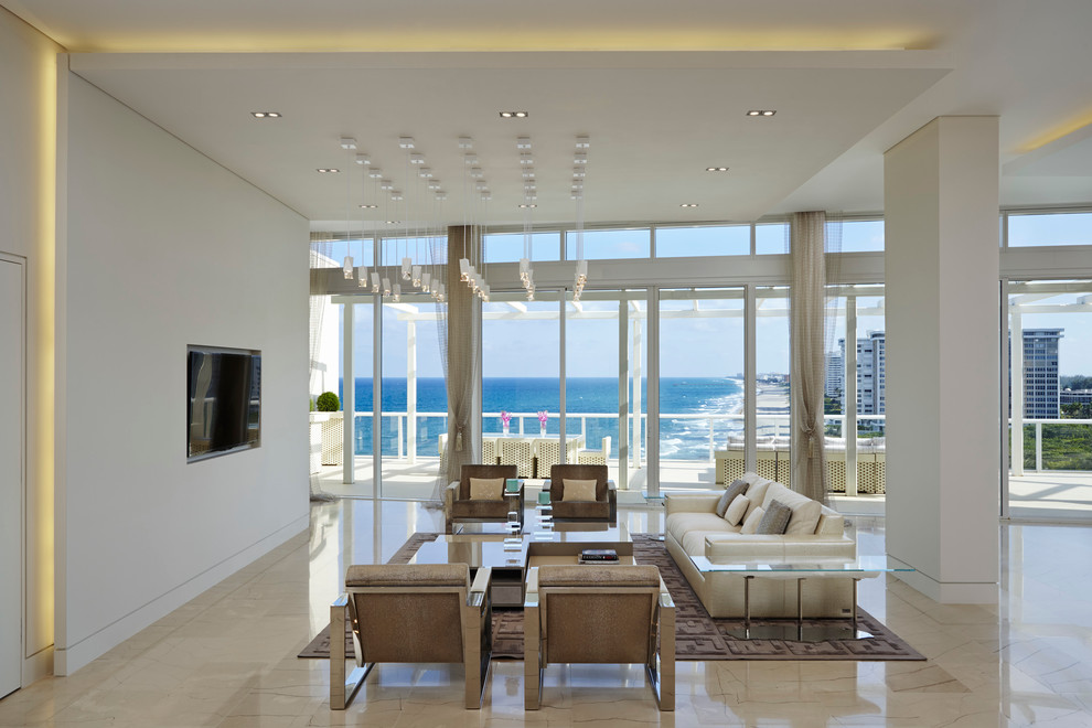 Inspiration for a contemporary open concept living room in Miami with white walls, no fireplace and a wall-mounted tv.