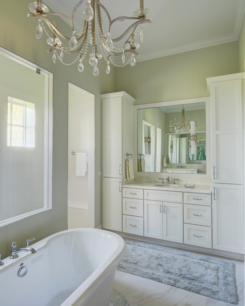 Design ideas for a large transitional master bathroom in Jacksonville with shaker cabinets, white cabinets, a freestanding tub, a curbless shower, a one-piece toilet, multi-coloured tile, glass sheet wall, grey walls, porcelain floors, an undermount sink, marble benchtops, white floor and an open shower.