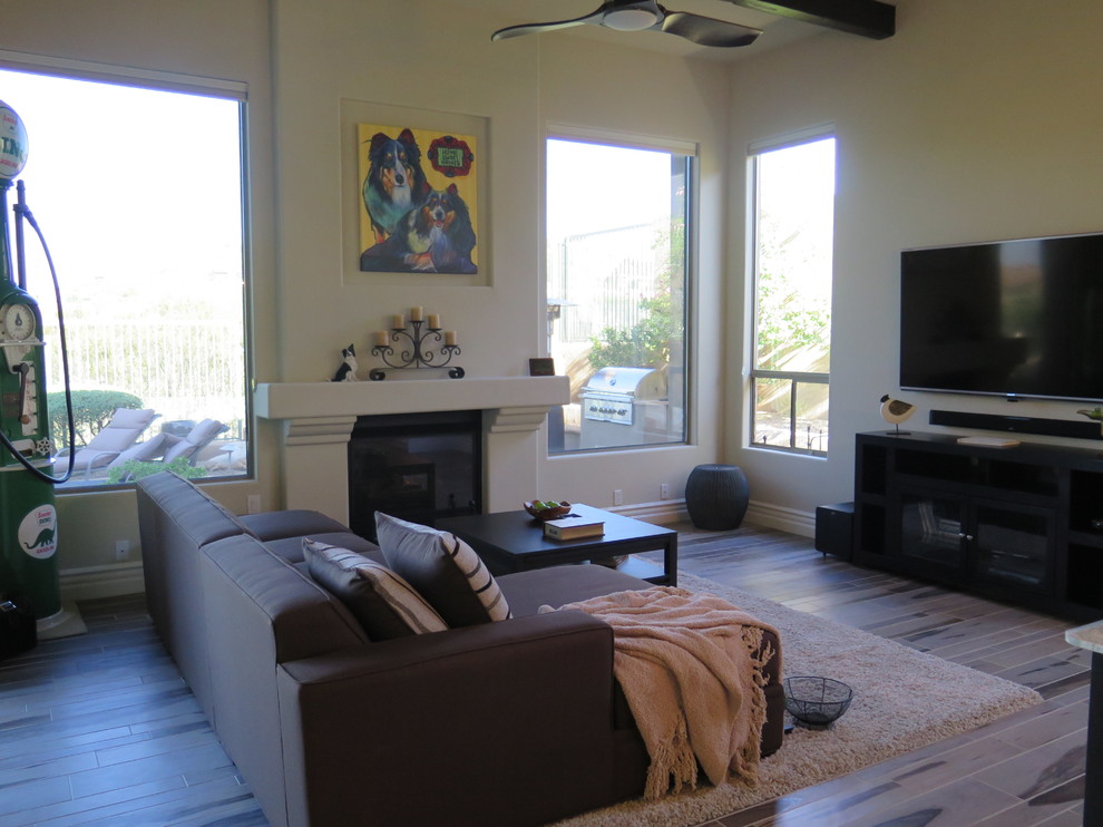 Photo of a large contemporary family room in Phoenix.