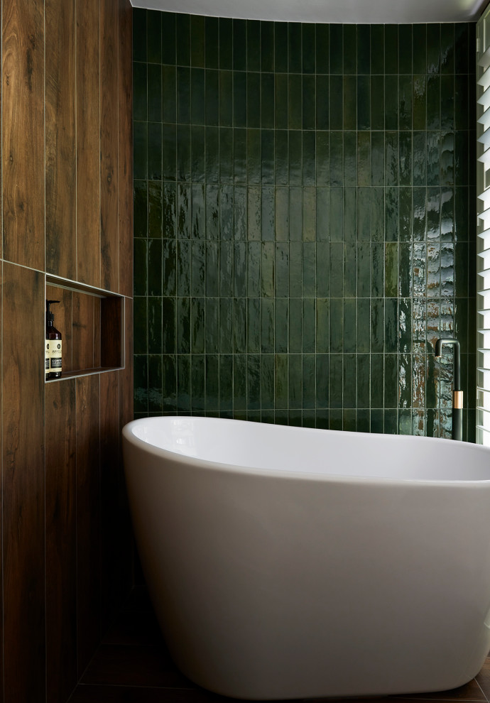Design ideas for a mid-sized asian bathroom in Sydney with flat-panel cabinets, medium wood cabinets, a japanese tub, an open shower, ceramic tile, ceramic floors, engineered quartz benchtops, black benchtops, a single vanity and a floating vanity.
