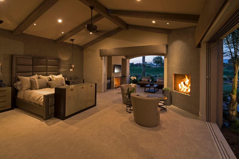 Mid-sized transitional guest carpeted bedroom photo with beige walls and a standard fireplace