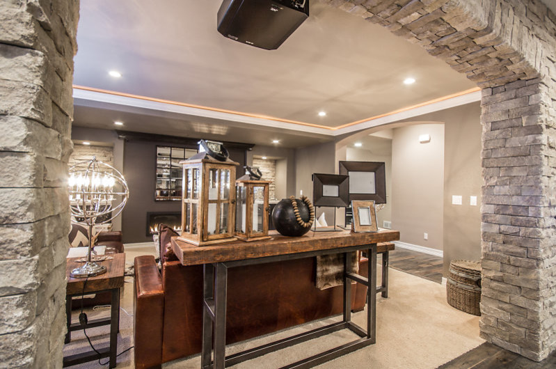 Basement - rustic basement idea in Denver