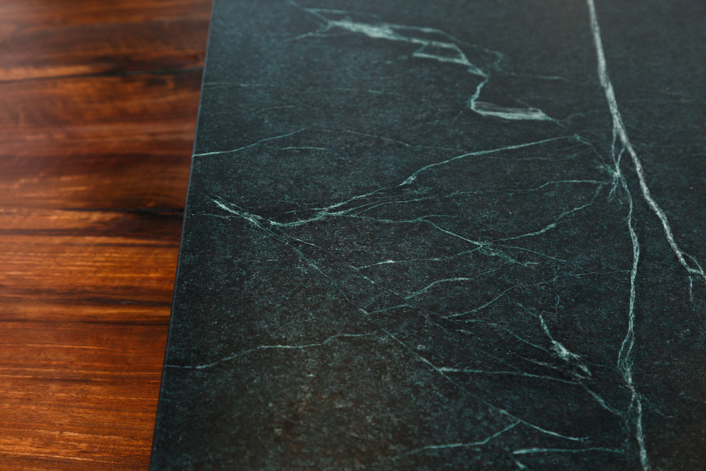 Inspiration for a large transitional l-shaped porcelain tile eat-in kitchen remodel in Austin with a single-bowl sink, shaker cabinets, gray cabinets, soapstone countertops, white backsplash, ceramic backsplash, stainless steel appliances and an island