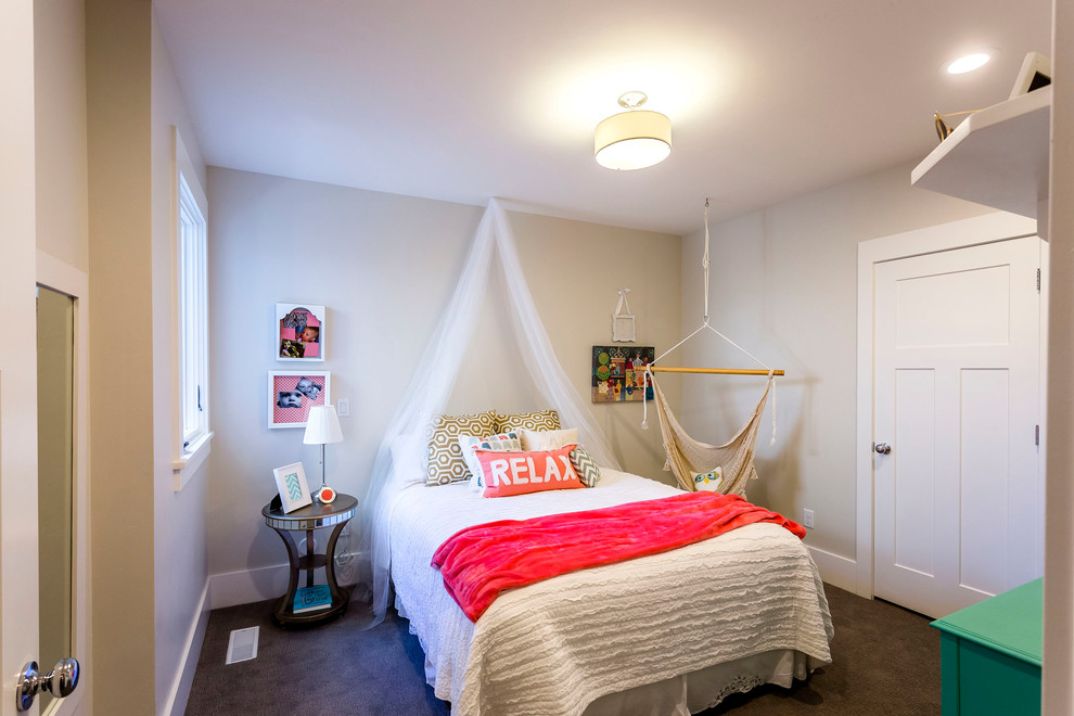 Photo of a mid-sized arts and crafts kids' room for girls in Salt Lake City with white walls and carpet.