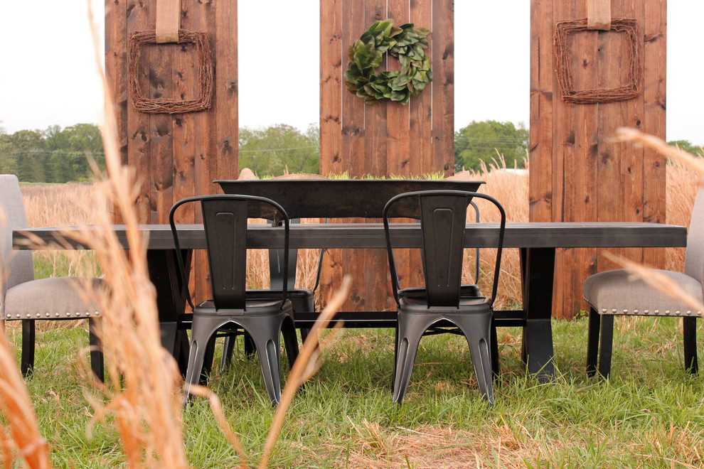 Example of a mid-sized mountain style backyard patio design with no cover