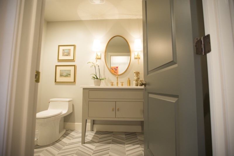 Inspiration for a mid-sized transitional 3/4 bathroom in Louisville with flat-panel cabinets, grey cabinets, a one-piece toilet, beige walls, porcelain floors, an undermount sink, gray tile, white tile, porcelain tile and marble benchtops.