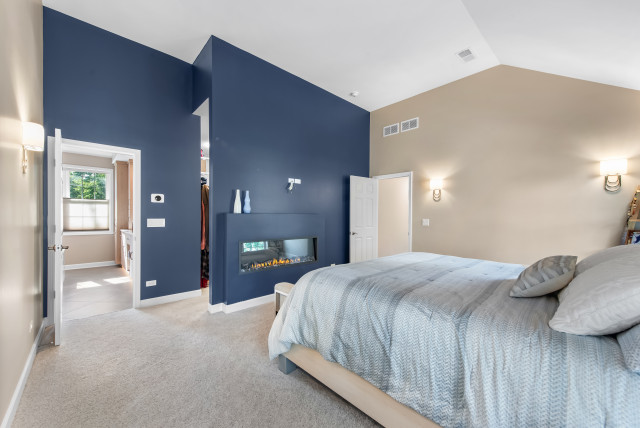 Royal St. George Renovation Master Bedroom scandinavian-bedroom