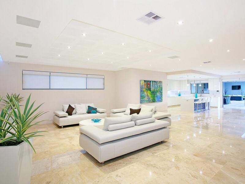 Design ideas for a contemporary living room in Sydney with marble floors.