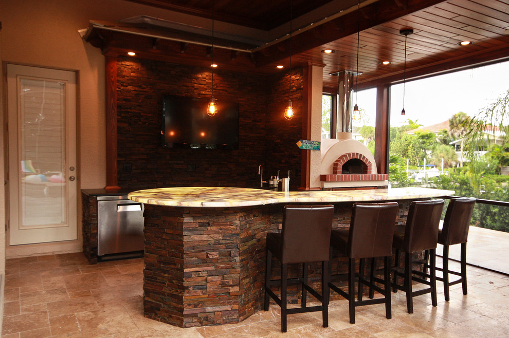 Expansive transitional home bar in Tampa.