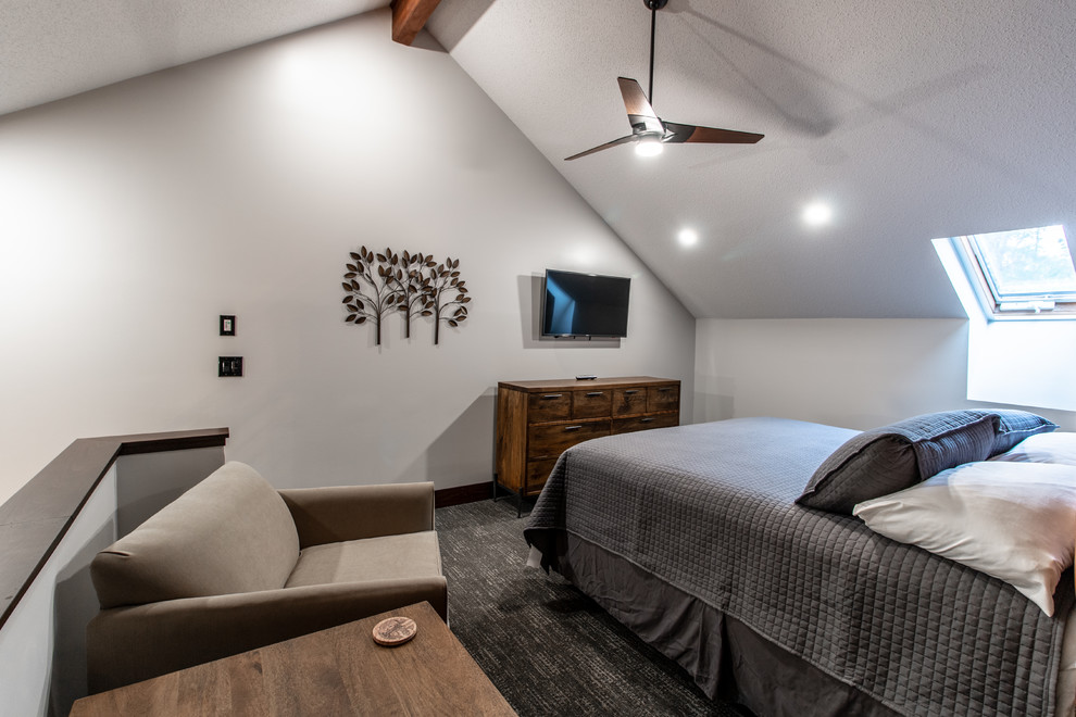 Inspiration for a mid-sized transitional loft-style carpeted and gray floor bedroom remodel with brown walls