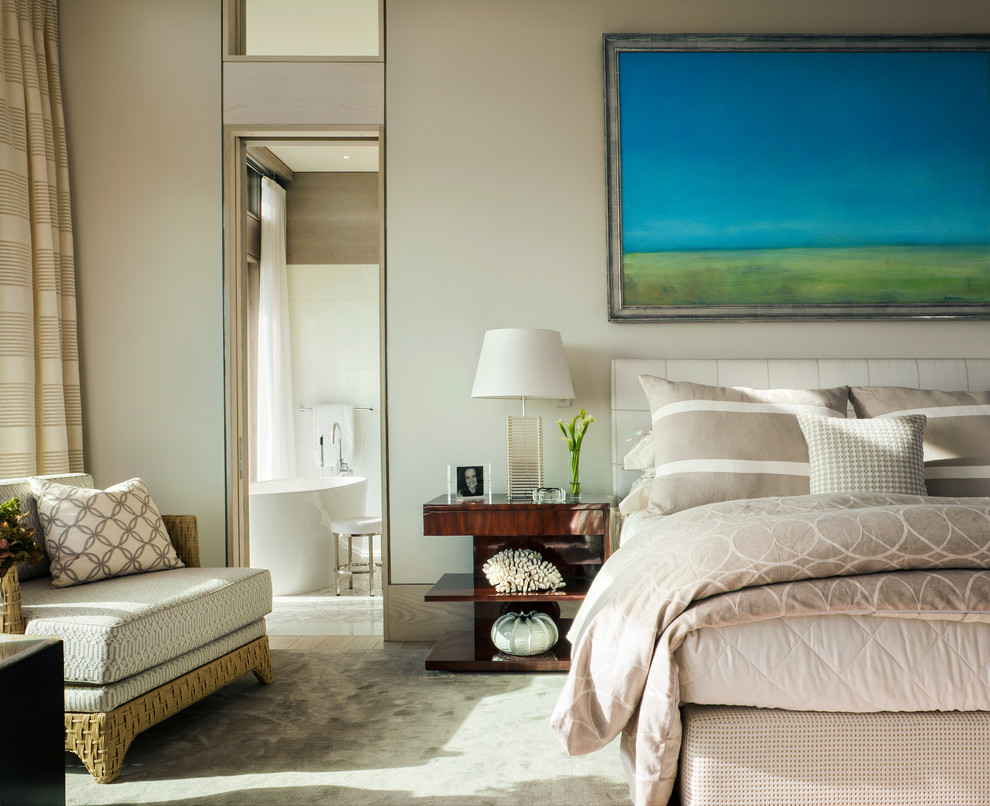 Photo of a traditional bedroom in Boston with beige walls.