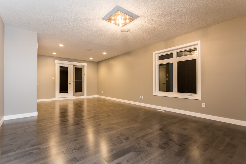 Transitional home design photo in Edmonton