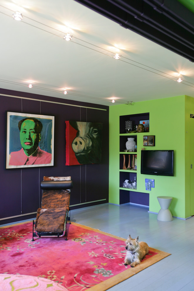 Inspiration for an eclectic living room in New York with green walls.