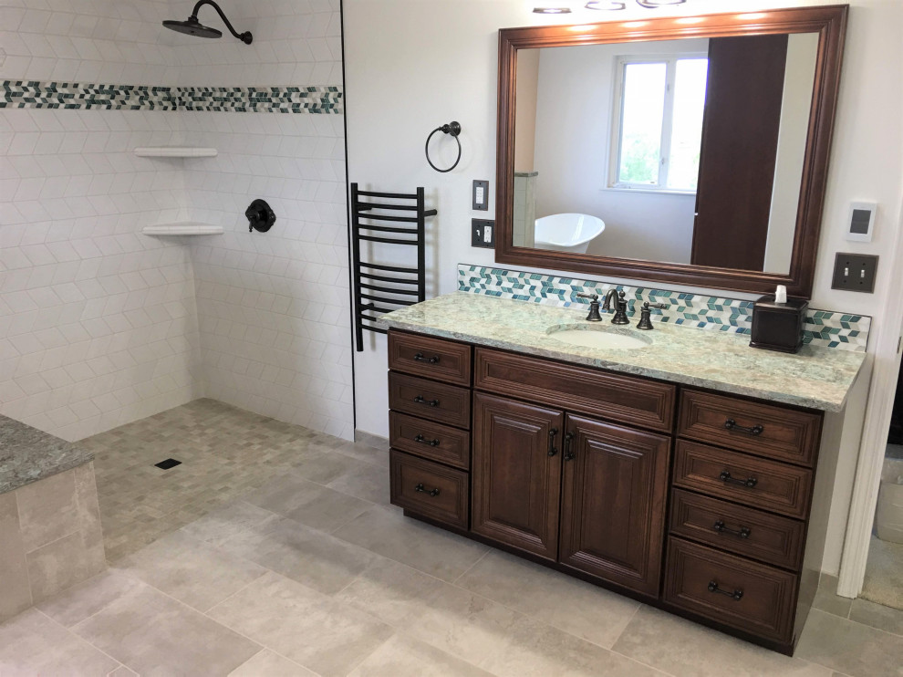 This is an example of a large traditional master bathroom in Other with raised-panel cabinets, dark wood cabinets, a claw-foot tub, a curbless shower, a two-piece toilet, white tile, porcelain tile, white walls, porcelain floors, an undermount sink, engineered quartz benchtops, grey floor, a hinged shower door, green benchtops, an enclosed toilet, a single vanity and a built-in vanity.