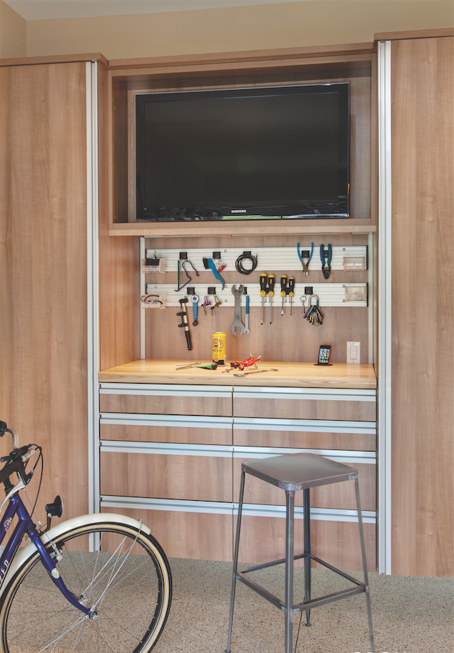 Large transitional attached two-car garage workshop photo in Columbus