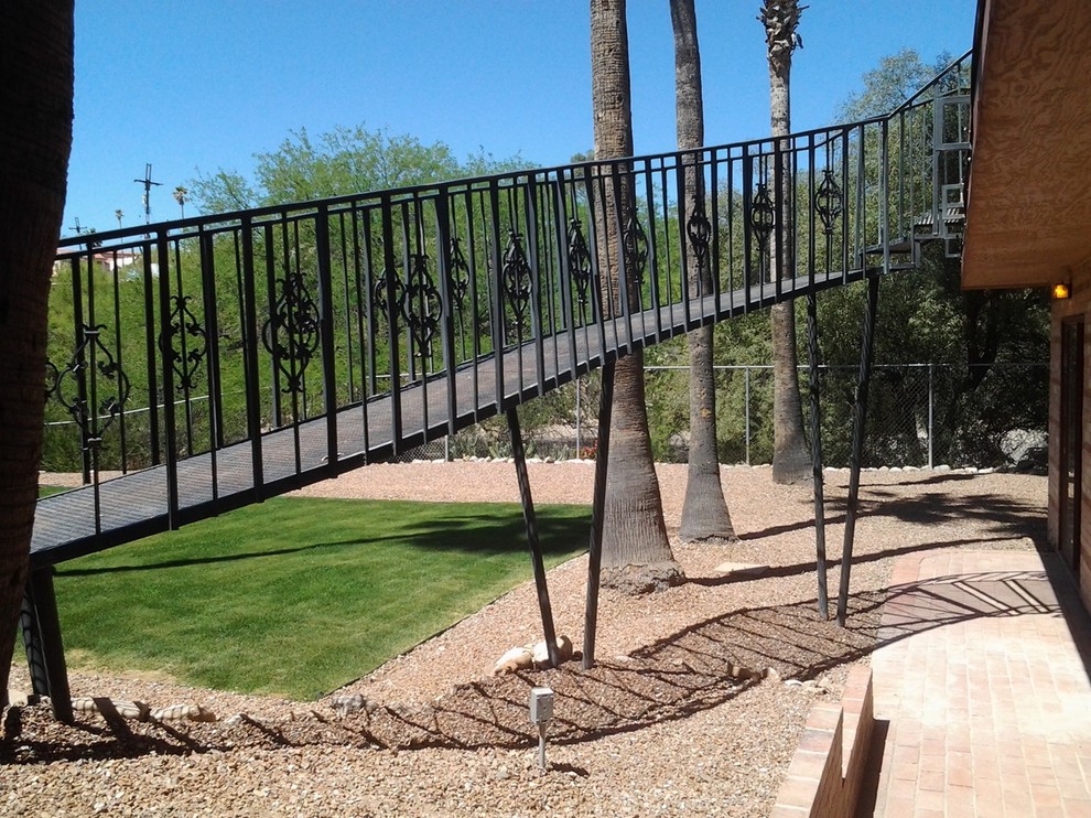 Example of a mountain style home design design in Phoenix