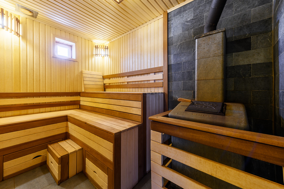 отделка дома из оцилиндрованного бревна