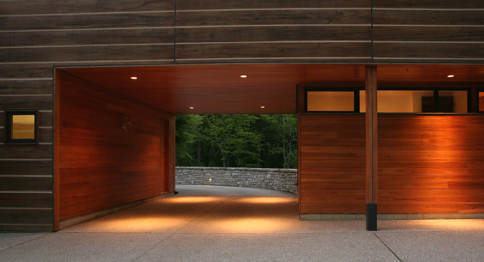 Inspiration for a large contemporary attached one-car carport in Cincinnati.