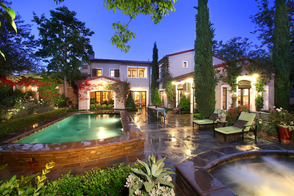 Photo of a mediterranean rectangular pool in Orange County.