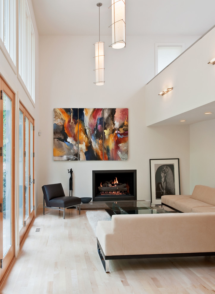 This is an example of a contemporary living room in Chicago with white walls.