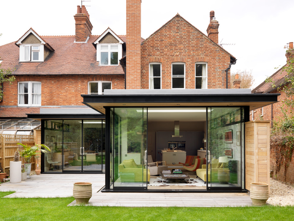 Inspiration for a modern two-storey brick exterior in Cheshire.
