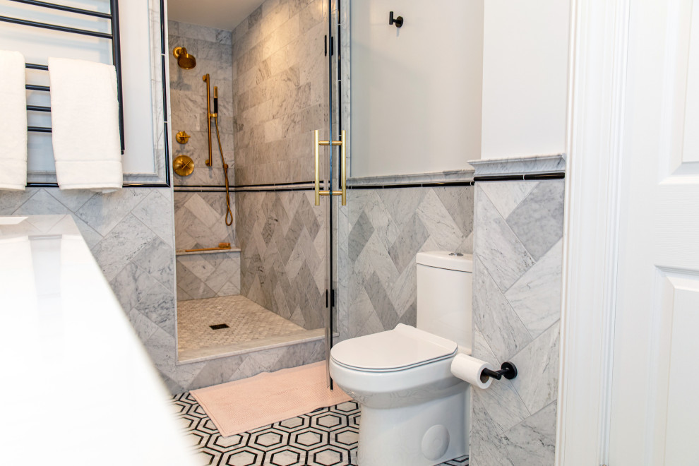 Photo of a traditional master bathroom in Baltimore with beaded inset cabinets, white cabinets, an alcove shower, marble, marble floors, a hinged shower door, white benchtops, a shower seat, a double vanity, a freestanding vanity and decorative wall panelling.