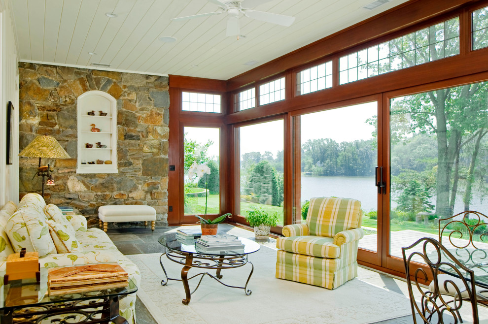 Design ideas for a classic conservatory in Baltimore with a feature wall.