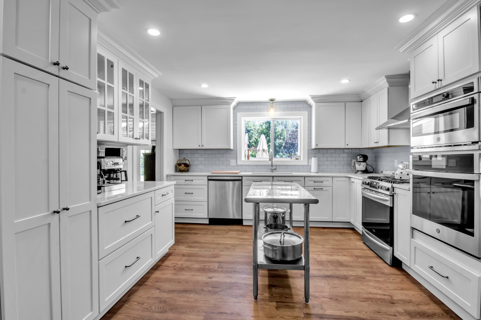 Example of a transitional kitchen design in New York